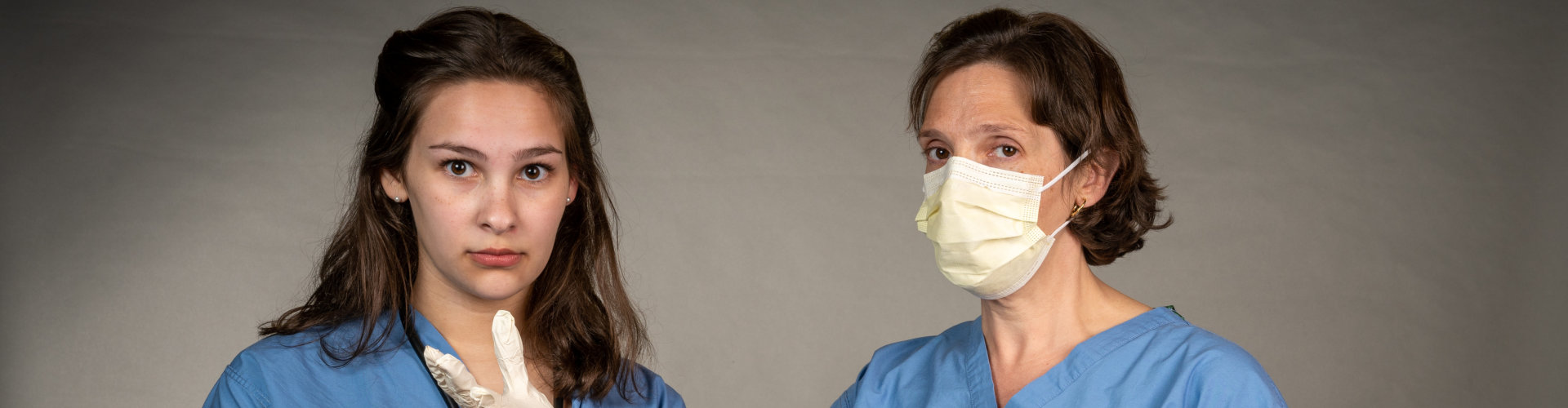 two nurses wear surgical mask